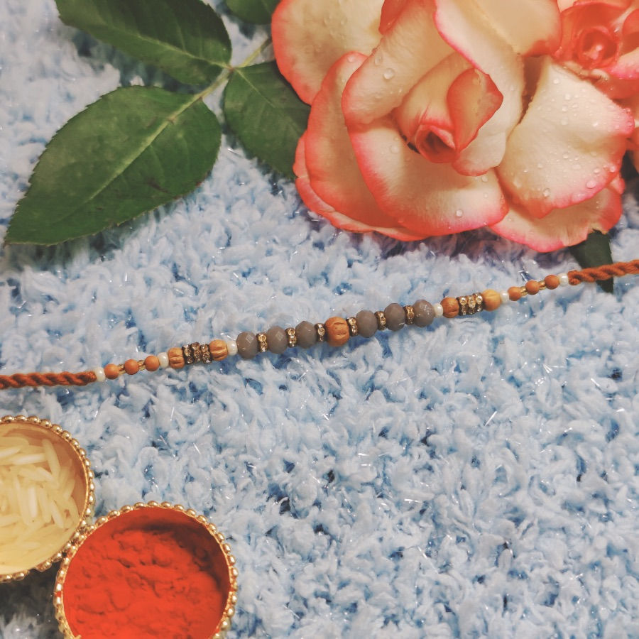 Dori Rakhi with Blue & Brown Pearl Beads