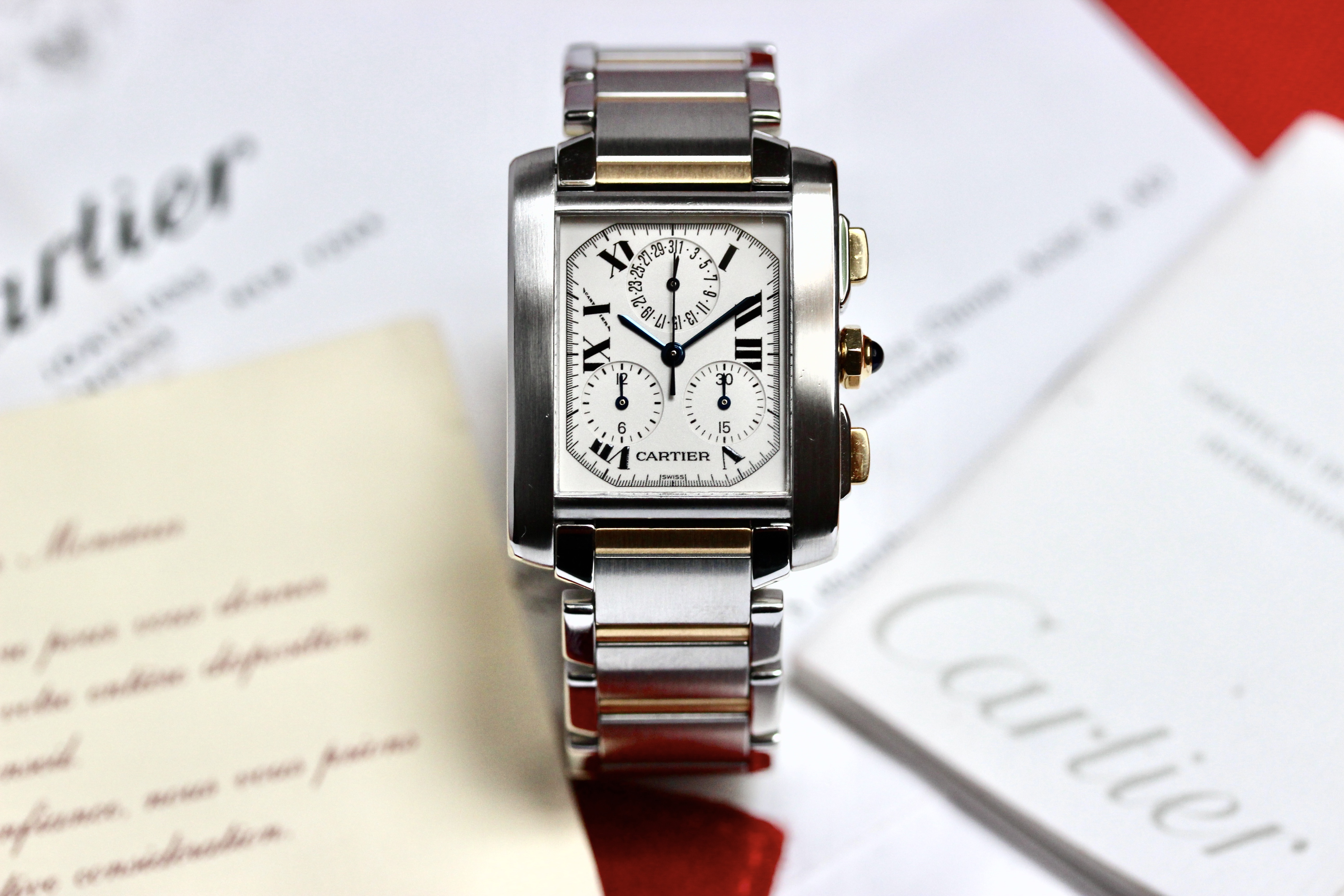 Zicht op Cartier Tank Frans ref 2303 goud/staal