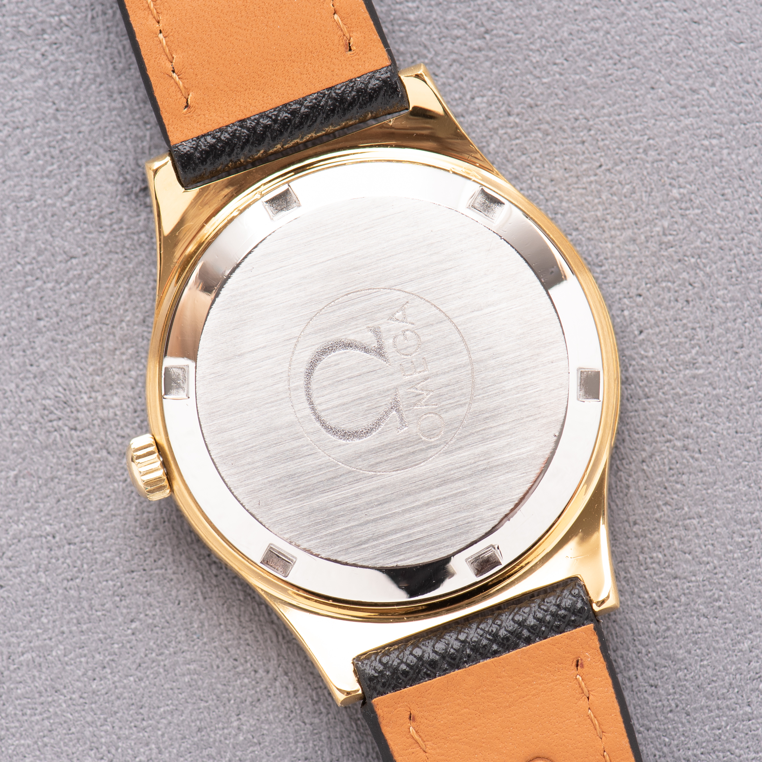 View of Omega Genève Automatique Date Goldplated Réf 166.0168 from 1974