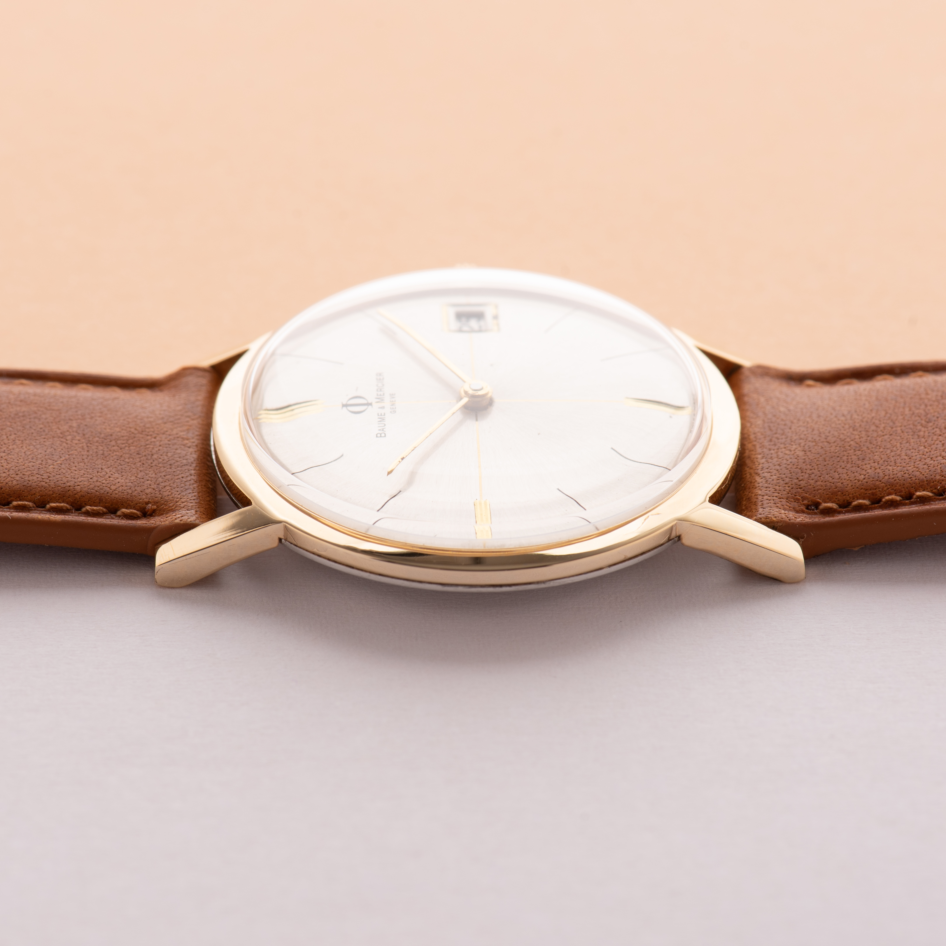 Zicht op Baume & Mercier Genève kruisdraad wijzerplaat mechanische ref 76929