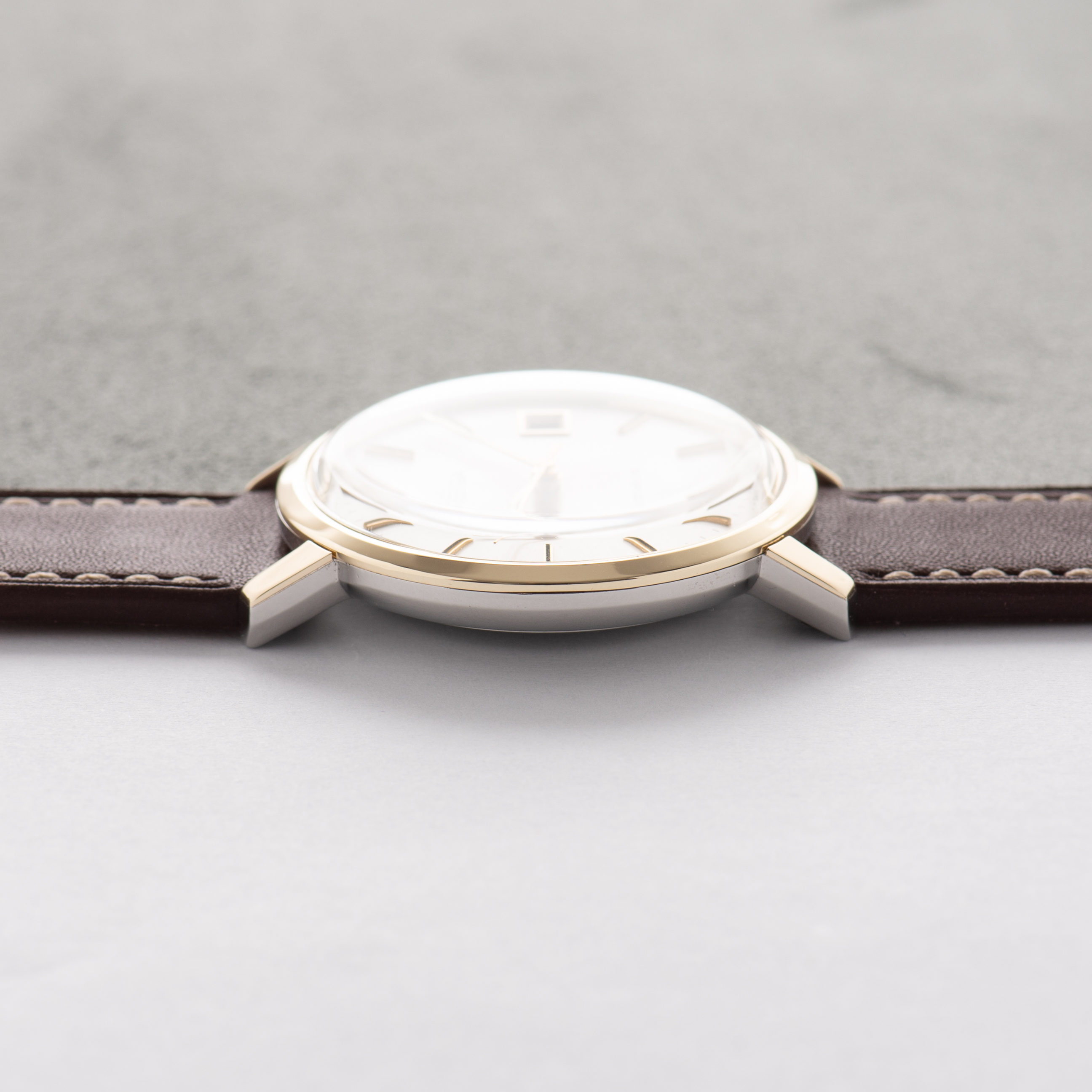 View of Omega Genève Date Gold/Steel Rare Monobloc Réf 136.9020 from 1975