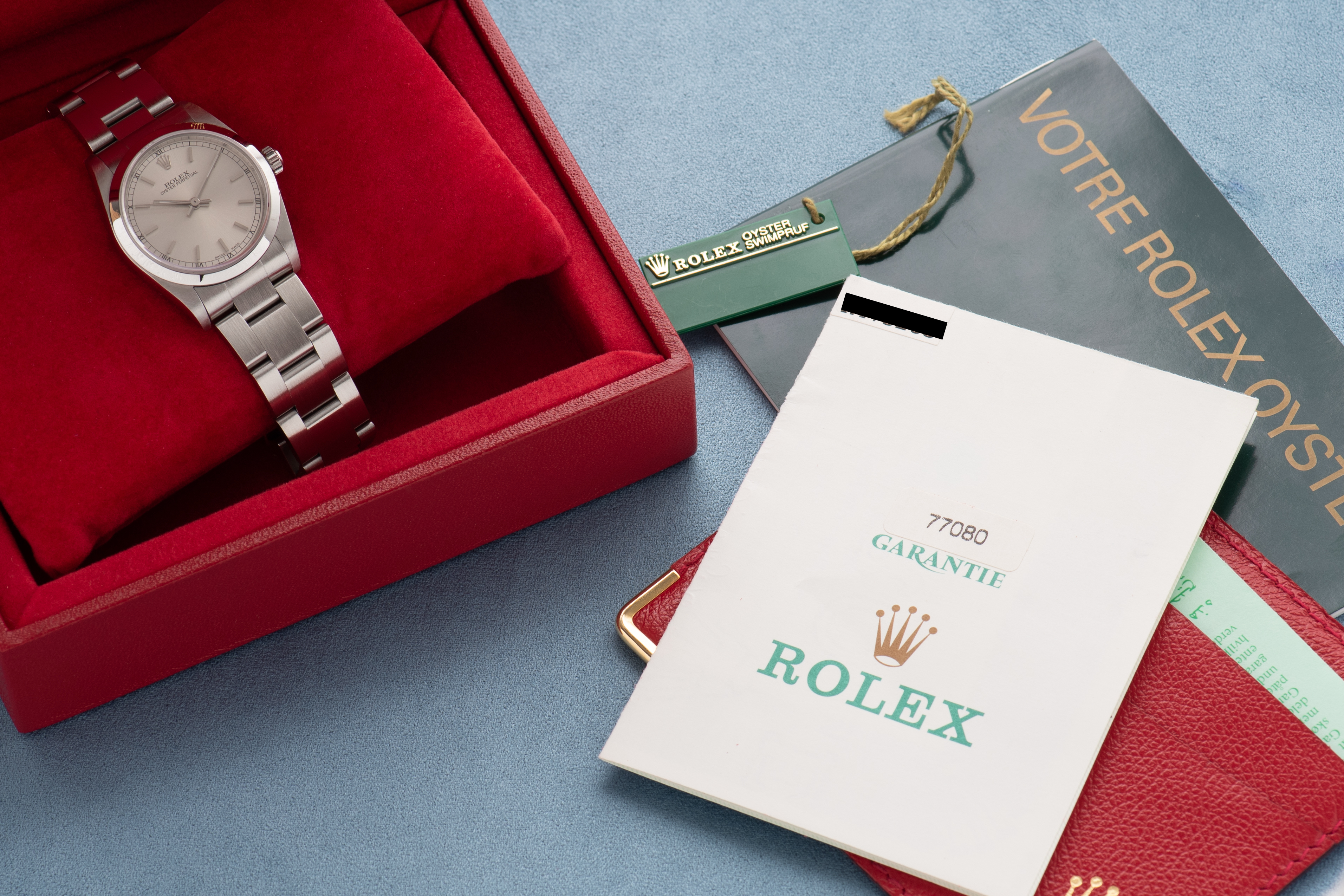 Zicht op Rolex Oyster Perpetual Silver Dial Réf 77080 Full set from 2005
