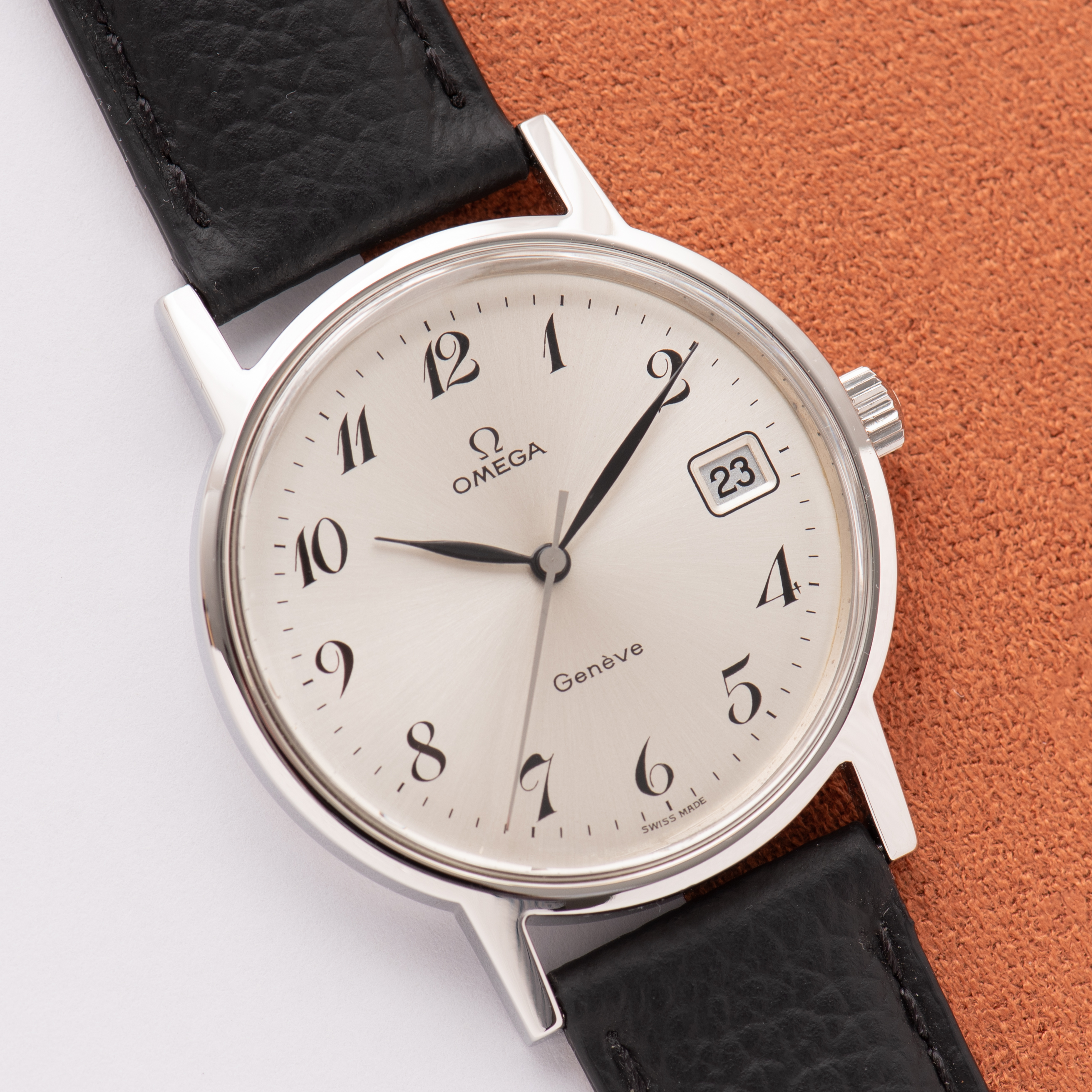 View of Omega Genève Date Silver Breguet Dial réf 136.0104 from 1974