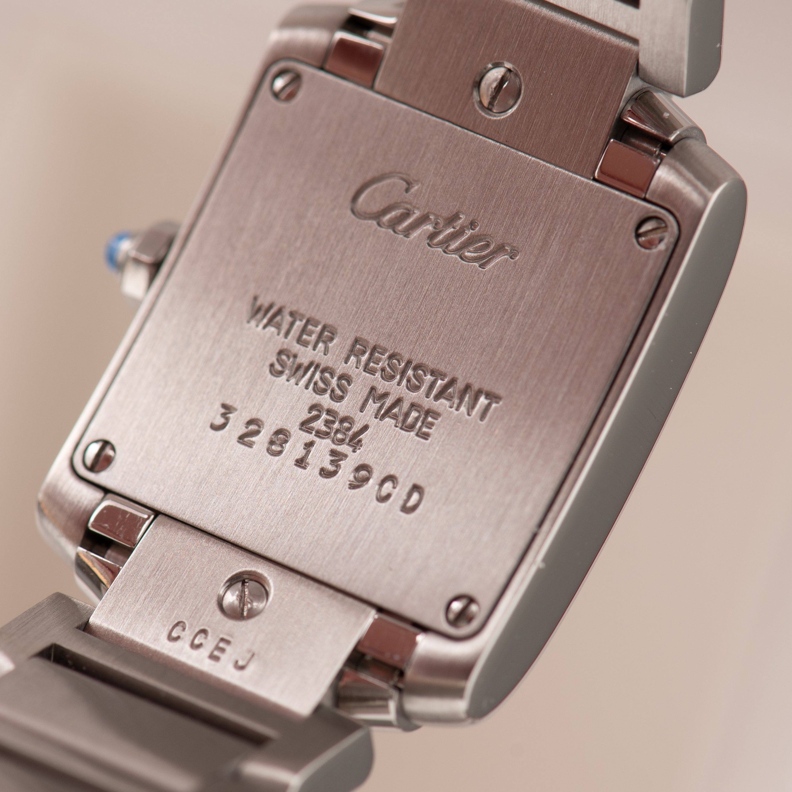 View of Cartier Tank Française SM Roman Dial Réf 2384 Full Set from 2000