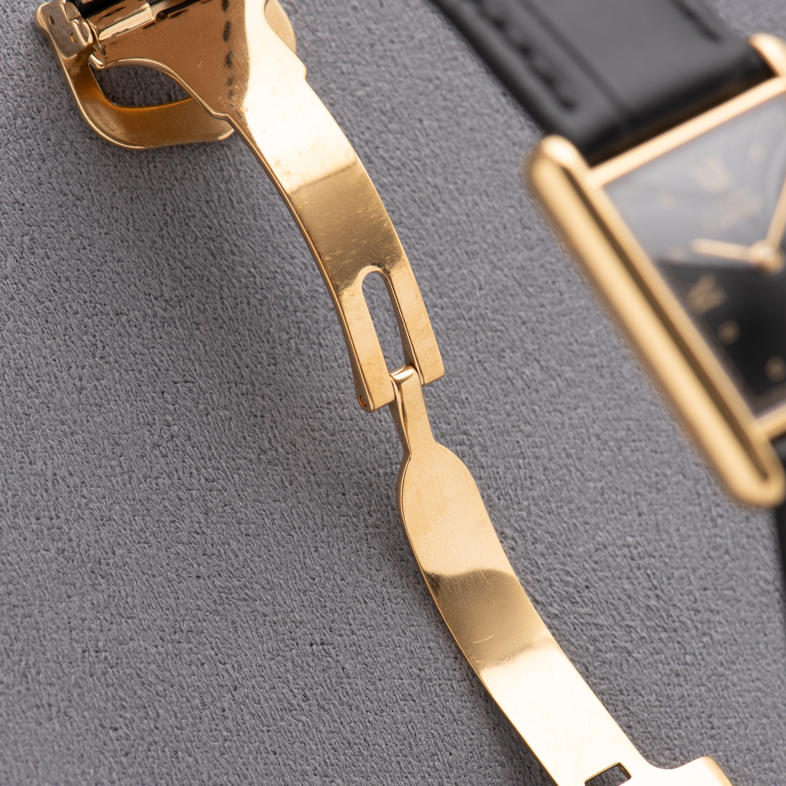 View of Cartier Tank De Must Vermeil GM Black Dial réf 01017 590005