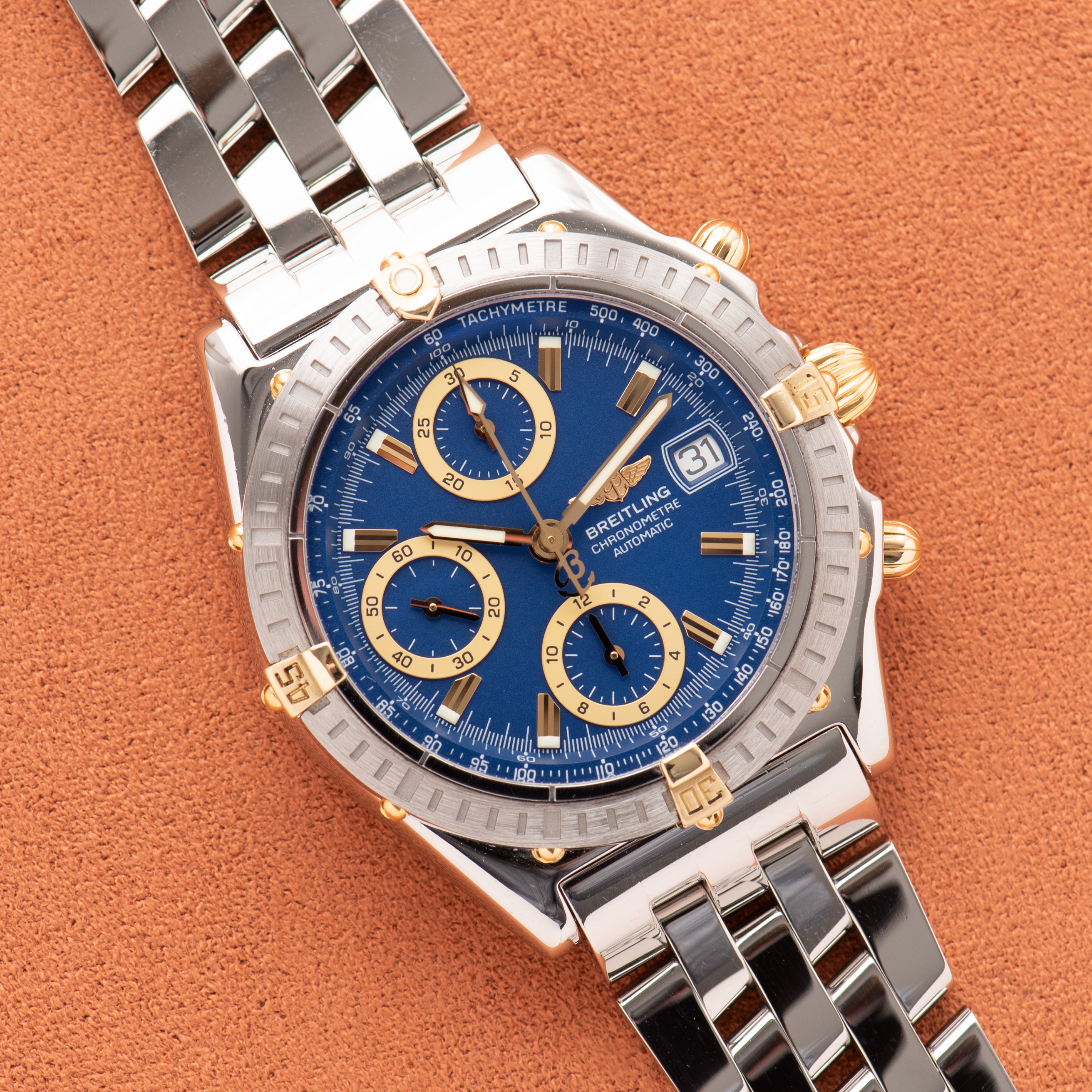 View of Breitling Chronomat Gold/Steel Chronograph Blue dial Réf D13352 FULL SET