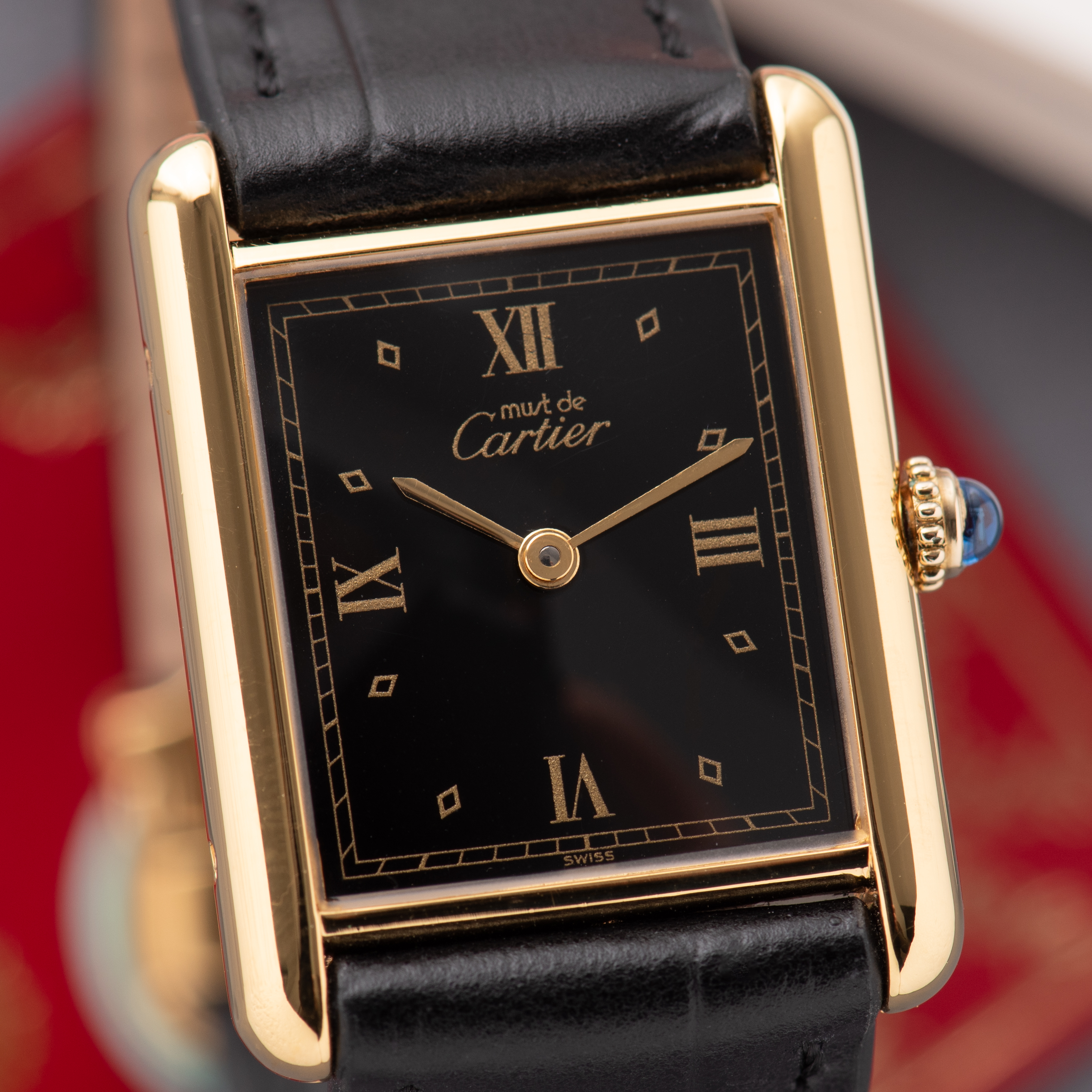 View of Cartier Tank De Must Vermeil GM Black Dial réf 01017 590005