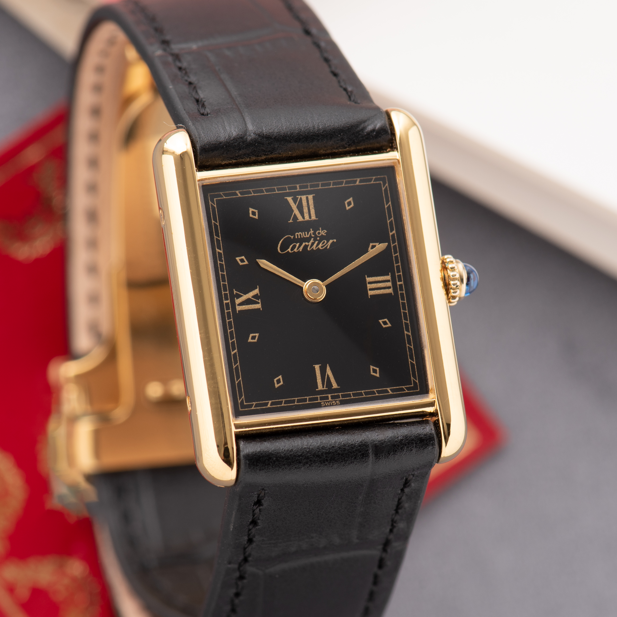 View of Cartier Tank De Must Vermeil GM Black Dial réf 01017 590005