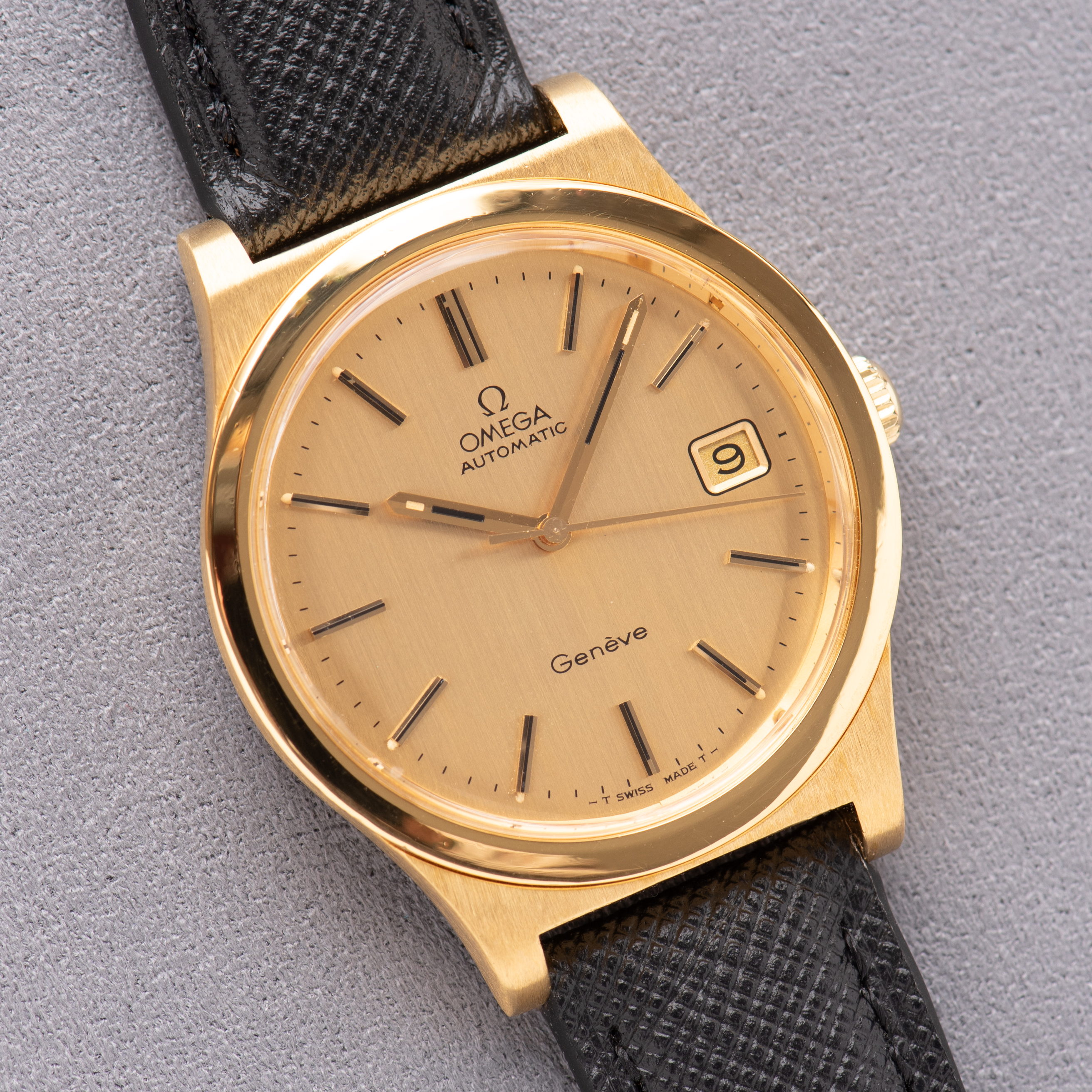 View of Omega Genève Automatique Date Goldplated Réf 166.0168 from 1974