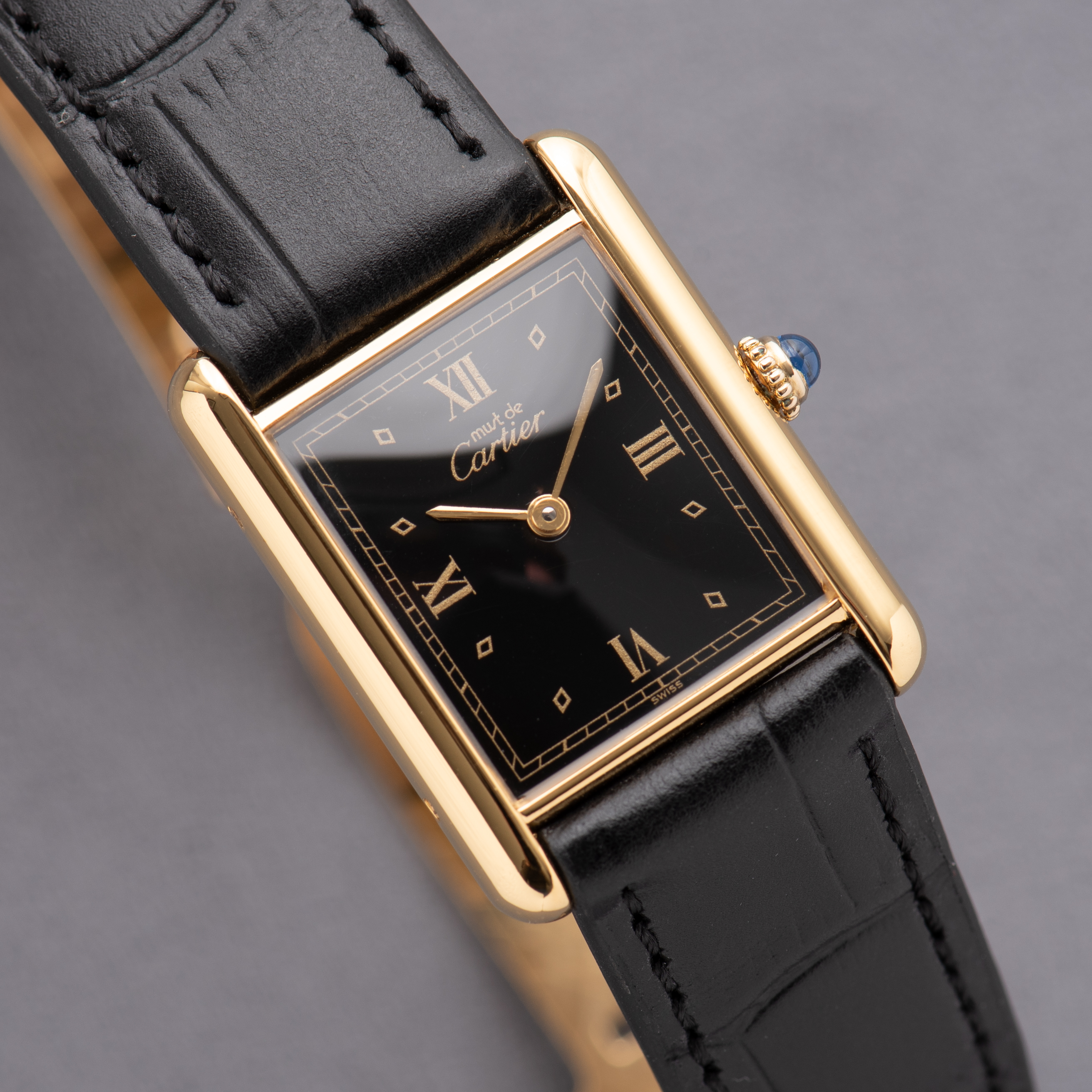 View of Cartier Tank De Must Vermeil GM Black Dial réf 01017 590005