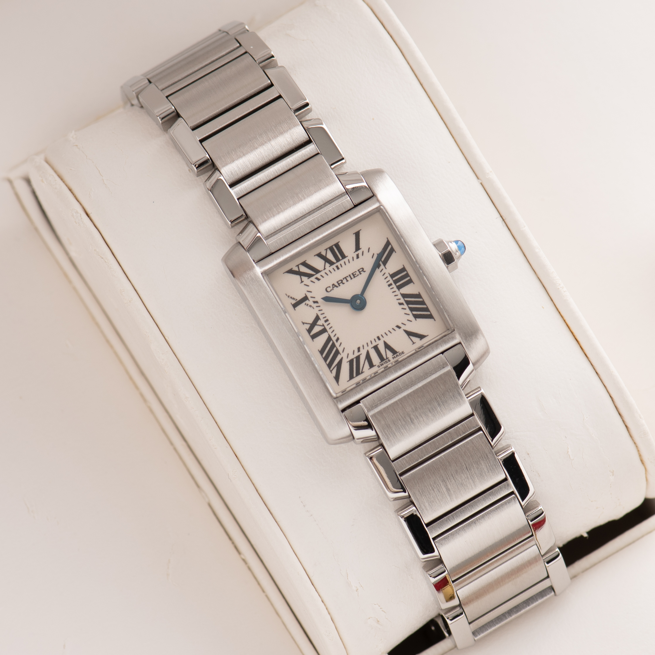 View of Cartier Tank Française SM Roman Dial Réf 2384 Full Set from 2000