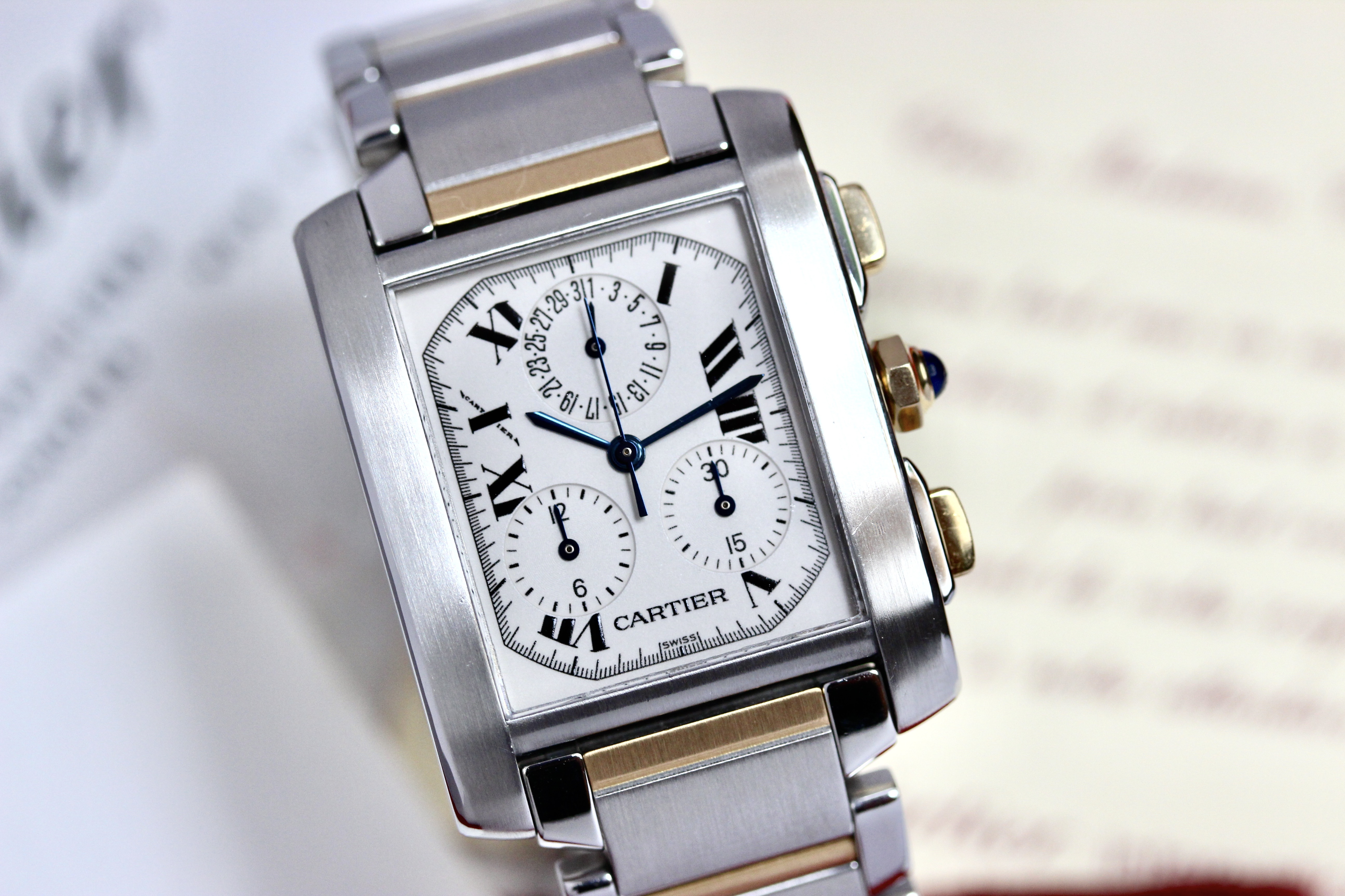 Zicht op Cartier Tank Frans ref 2303 goud/staal