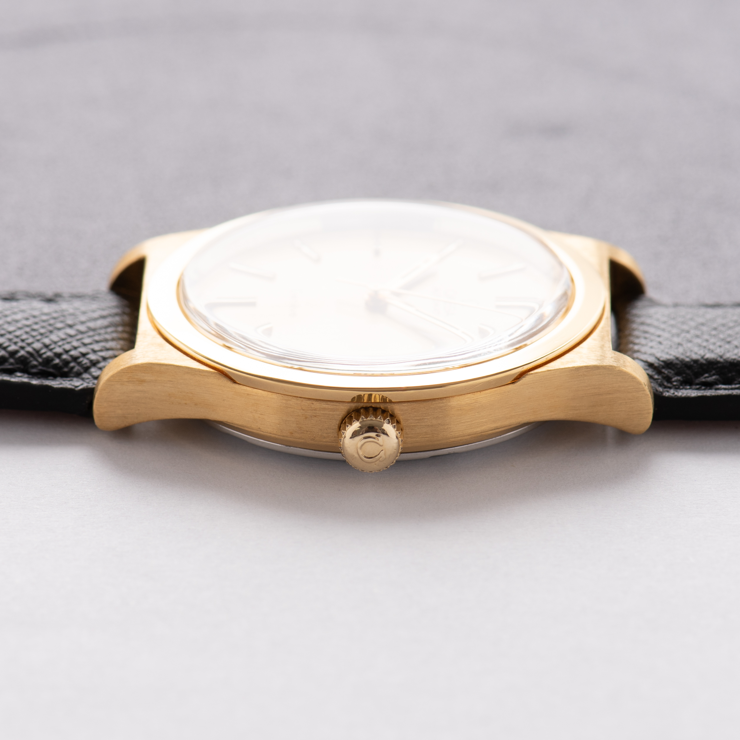 View of Omega Genève Automatique Date Goldplated Réf 166.0168 from 1974