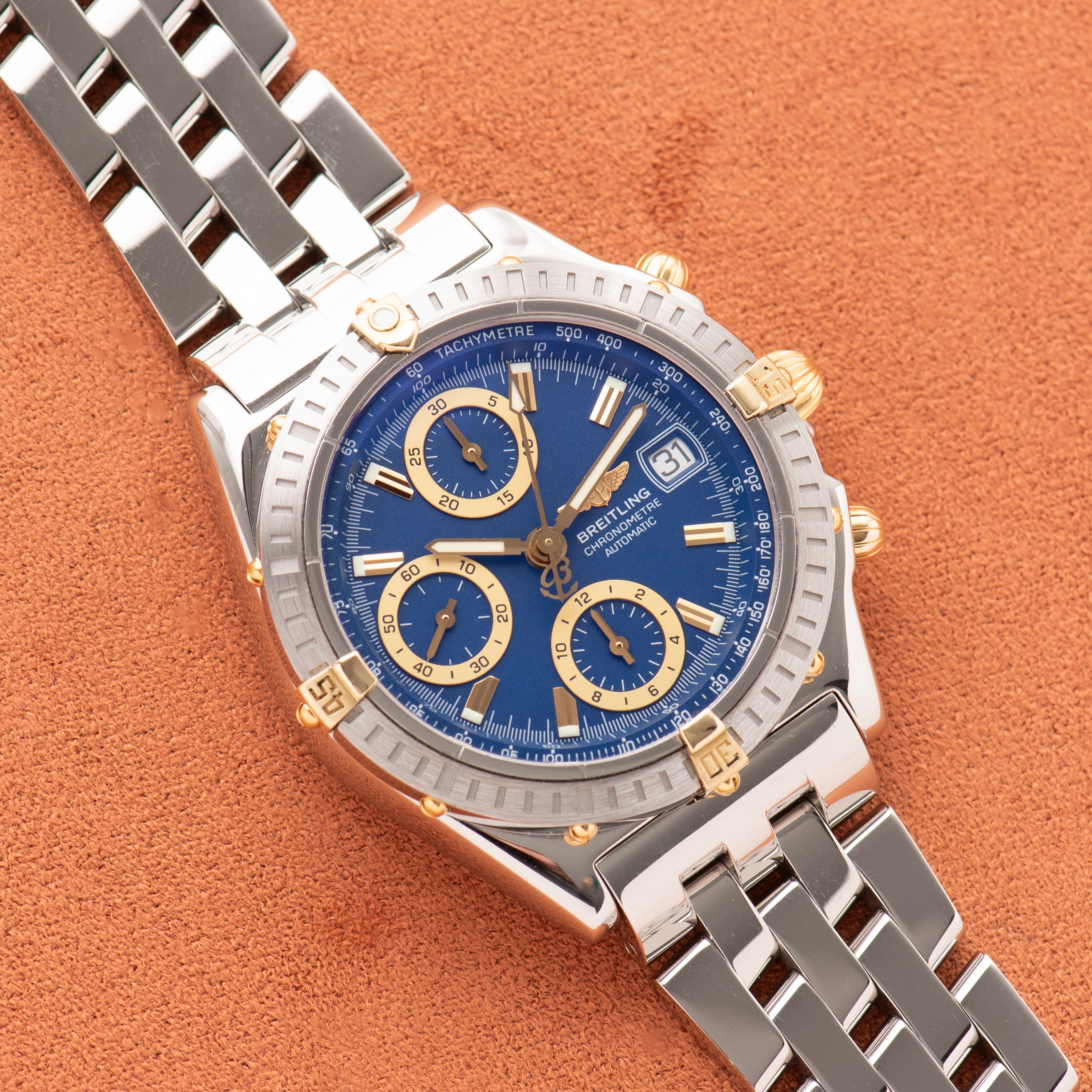View of Breitling Chronomat Gold/Steel Chronograph Blue dial Réf D13352 FULL SET