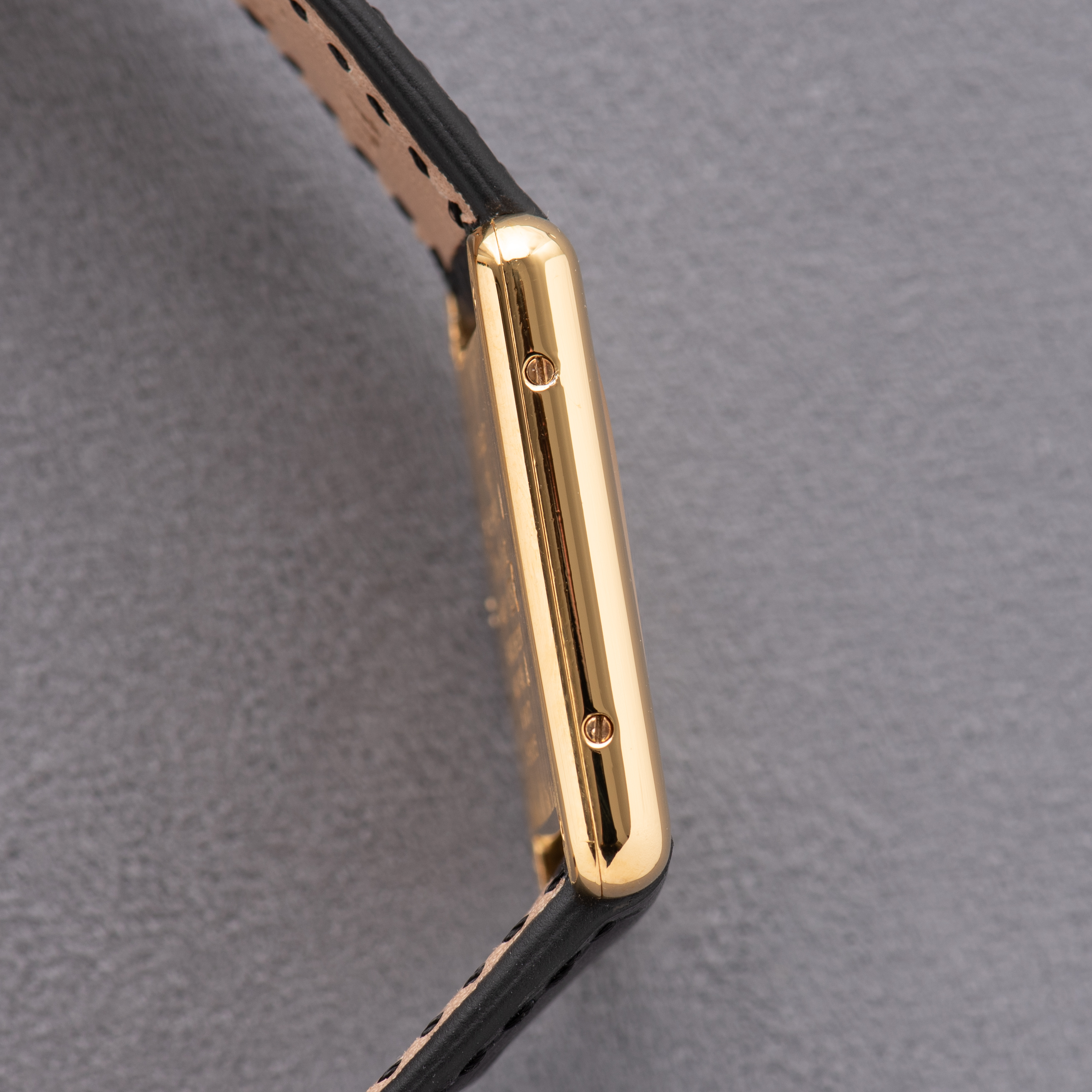 View of Cartier Tank De Must Vermeil GM Black Dial réf 01017 590005