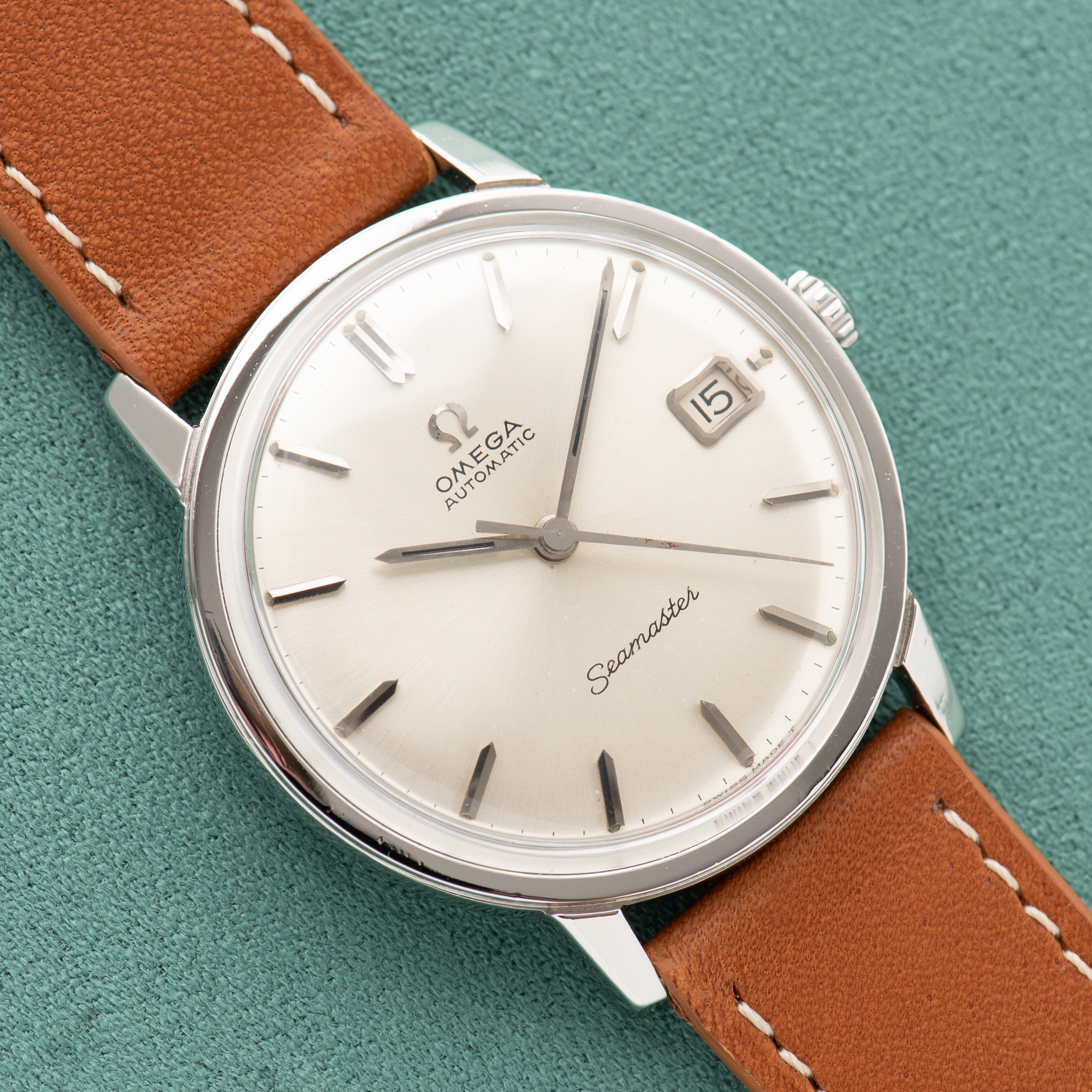 View of Omega Seamaster Automatic Date Silver Dial Ref 166.002 from 1964