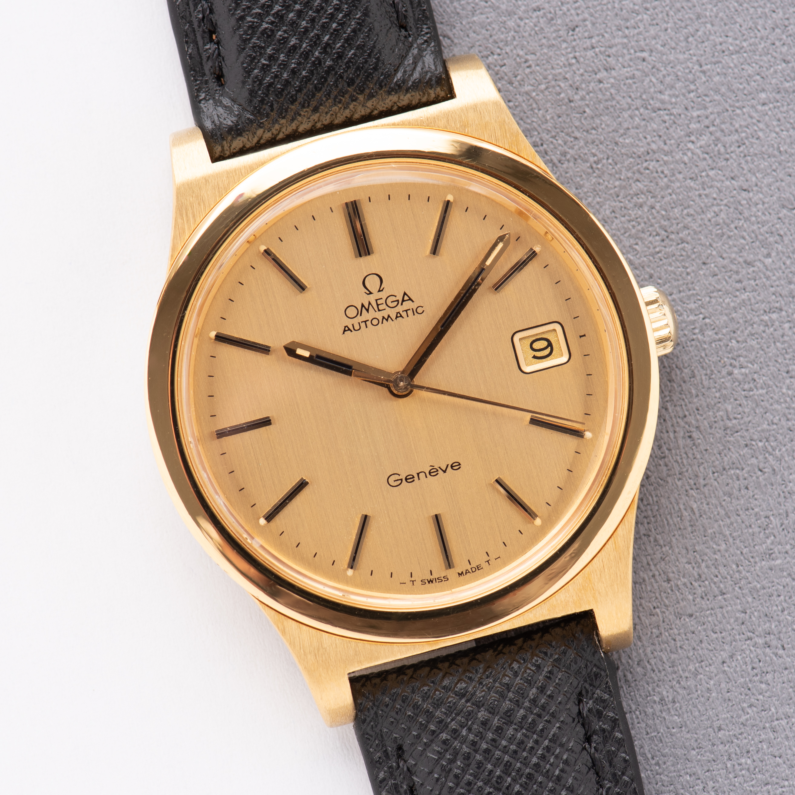 View of Omega Genève Automatique Date Goldplated Réf 166.0168 from 1974