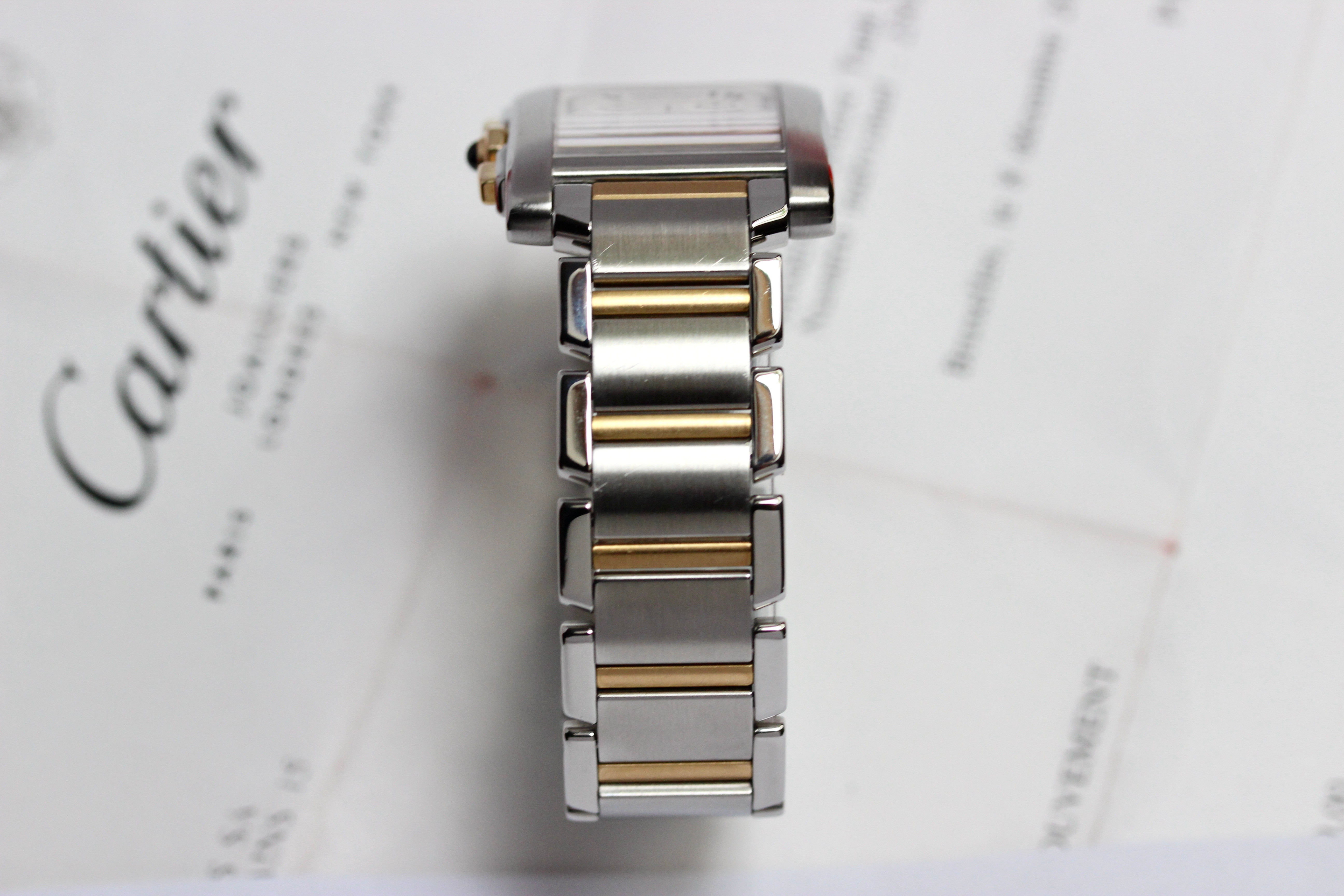View of Cartier Tank Française réf 2303 or/acier