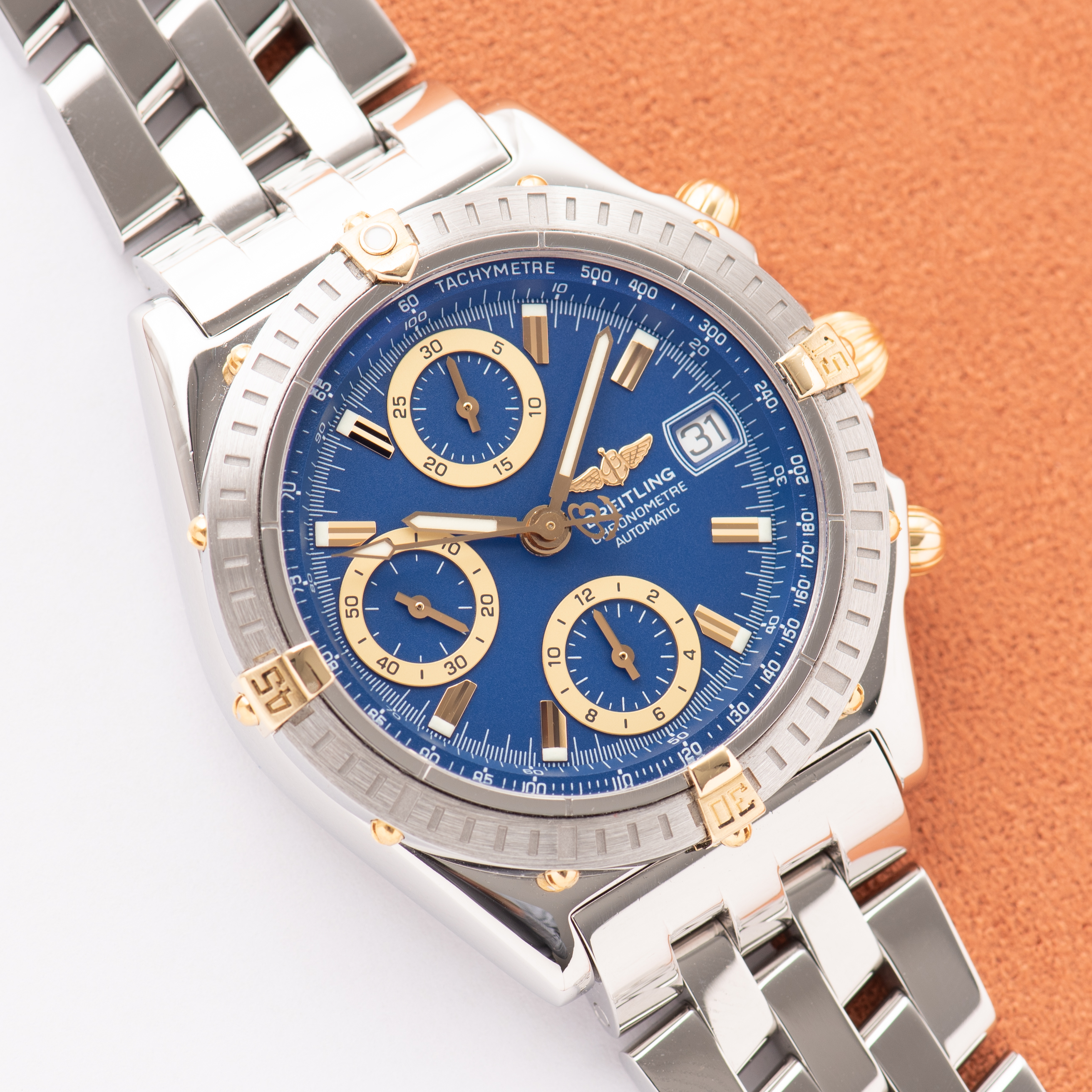 View of Breitling Chronomat Gold/Steel Chronograph Blue dial Réf D13352 FULL SET