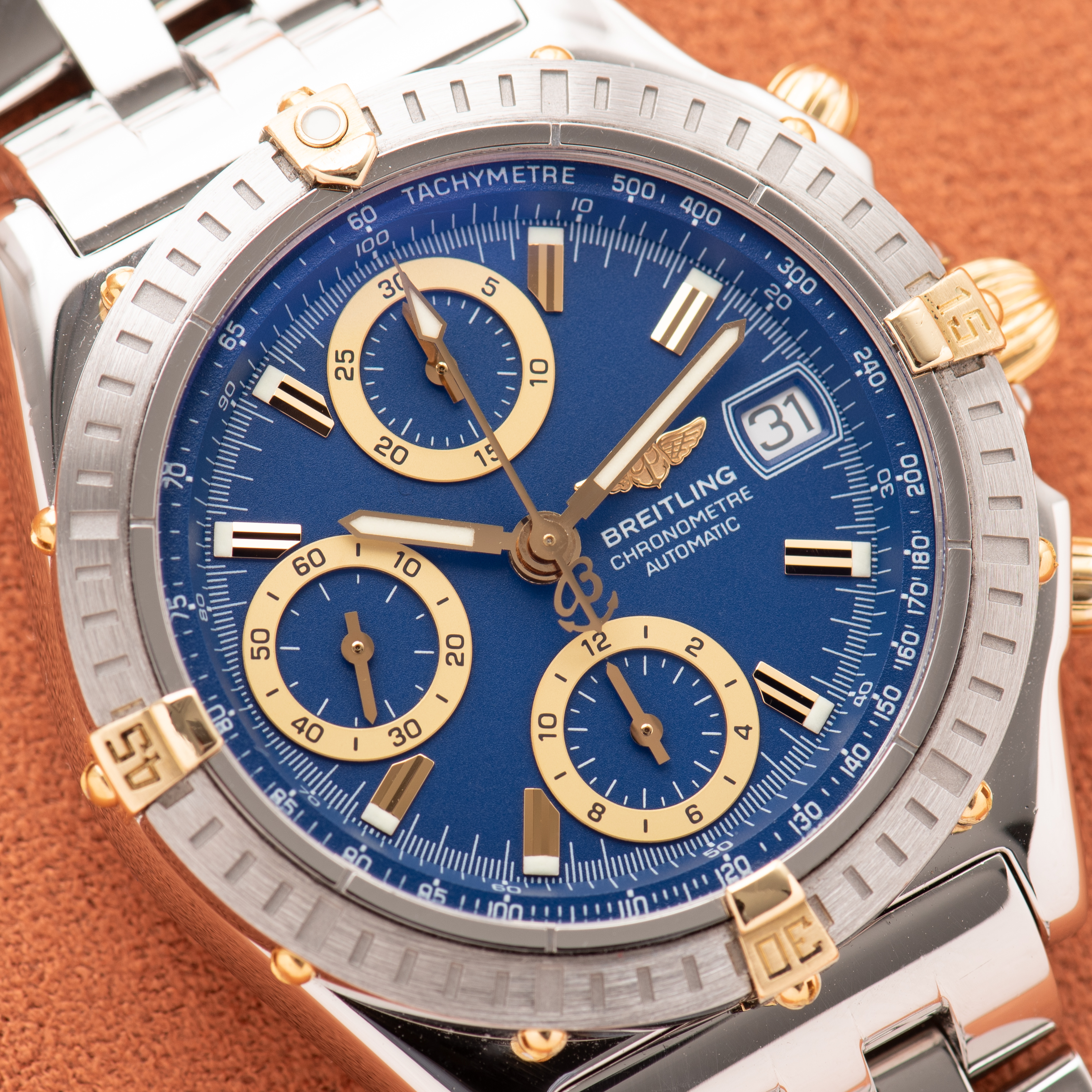 View of Breitling Chronomat Gold/Steel Chronograph Blue dial Réf D13352 FULL SET