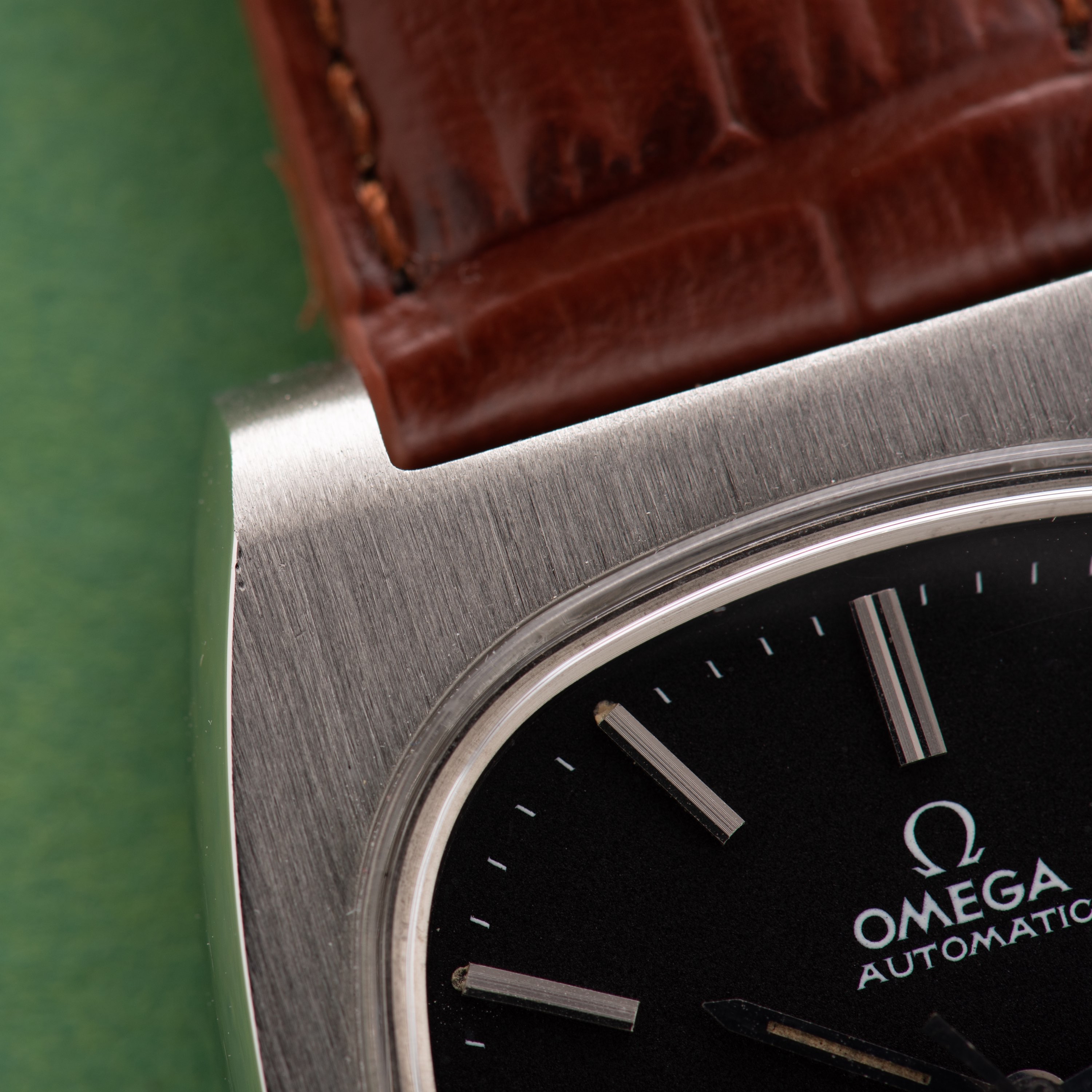 View of Omega Genève Automatic Date Square TV black dial ref 166.0190 from 1973