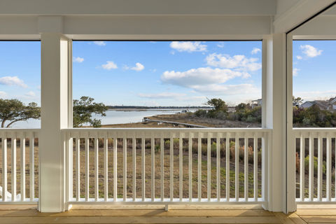 Waterfront view from a custom-built coastal home overlooking Emerald Isle by North Carolina luxury home builder.