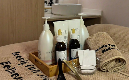 Treatment room at Beauty Full Skin Wellness Tampines outlet featuring Bojin tools, skincare products and a relaxing wellness environment