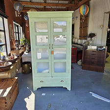 Pale green cabinet with drawers