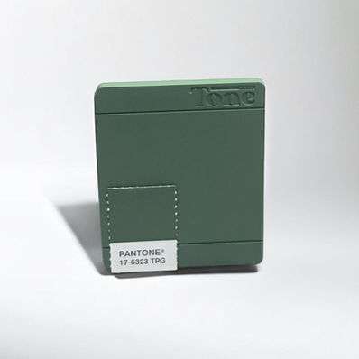Tone Studio color sample custom matched to Pantone 17-6323 TPG, a deep and rich green with a refined, nature-inspired aesthetic. This precisely calibrated shade balances sophistication and depth, making it ideal for product design, home goods, and industrial applications.
