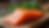 Close-up view of smoked salmon fillet on wooden board