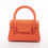 Miniature : Sac à main femme orange, design en cuir gaufré, poignée et détails, sur fond blanc.