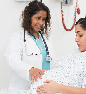 Doctor examining pregnant patient