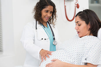 Doctor Examining a Pregnant Woman