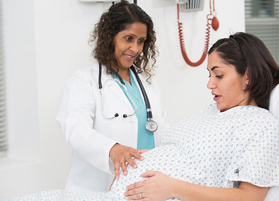 Doctor examining pregnant patient