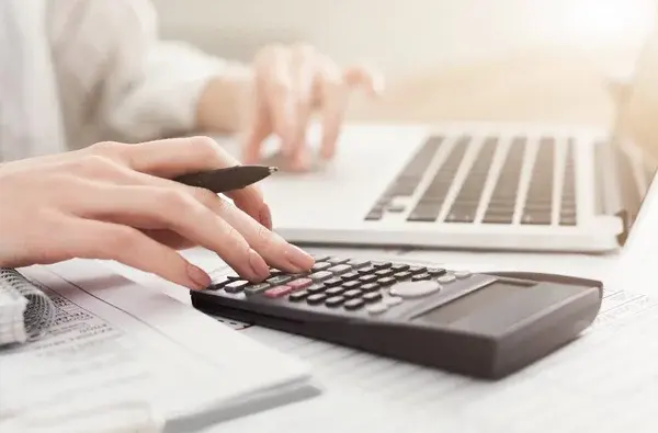 depositphotos_202582736-stock-photo-business-woman-checking-company-balance.jpg