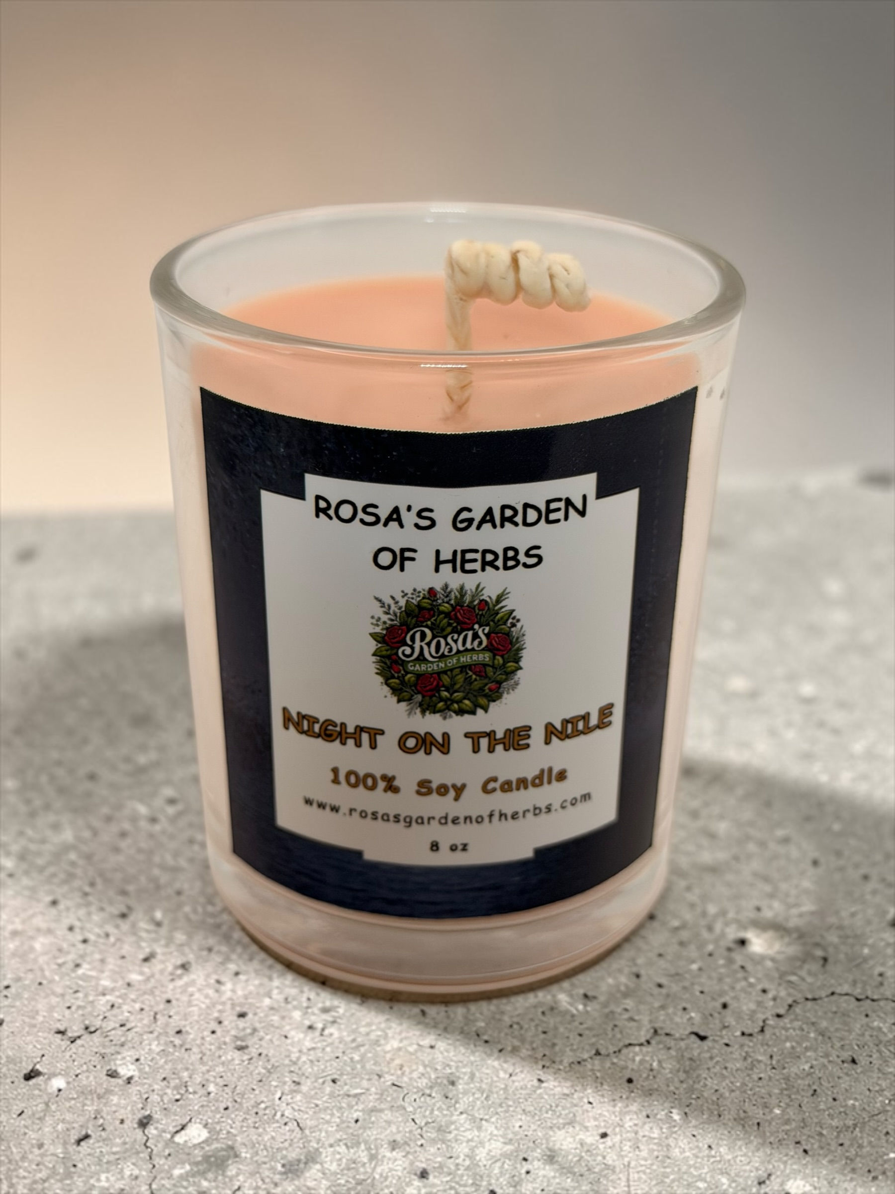 Night on the Nile 8 oz soy candle in clear glass jar with warm golden wax and night‑themed label