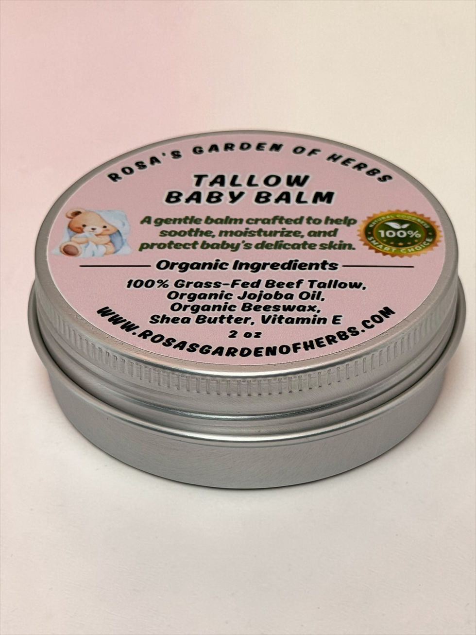 Miniatura: Tallow Baby Balm 2 oz tin with pink label on stone background