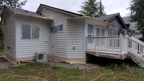house during prep, house exterior prep, primed house