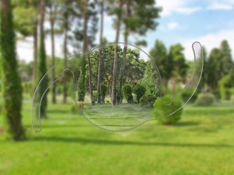 image of intraocular lens making a view of trees and grass much clearer, representing intraocular lens coatings and IOL injector coatings
