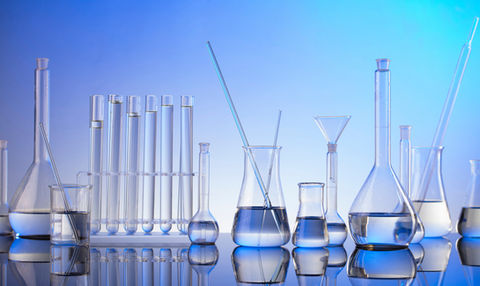 glass test tubes, pipettes, beakers, flasks, stirring rods, and funnel, representing glass coatings