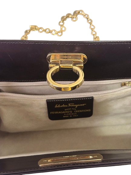 Thumbnail: Ferragamo Diana leather clutch