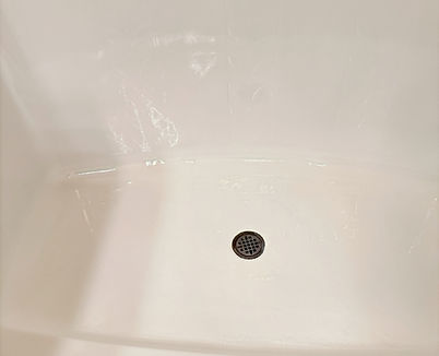 Fiberglass shower floor after crack repair and reglazing