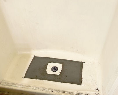 Structural support and reinforcement under fiberglass tub floor