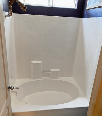 - Fiberglass shower after professional refinishing