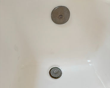 Fiberglass tub side wall after crack repair and refinishing