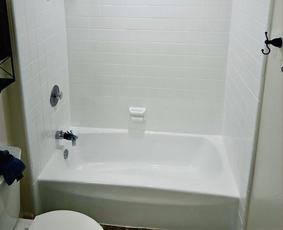 Finished ceramic tile shower after professional reglazing