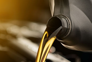 pouring-oil-lubricant-motor-car-from-black-bottle-isolated-white-background.jpg