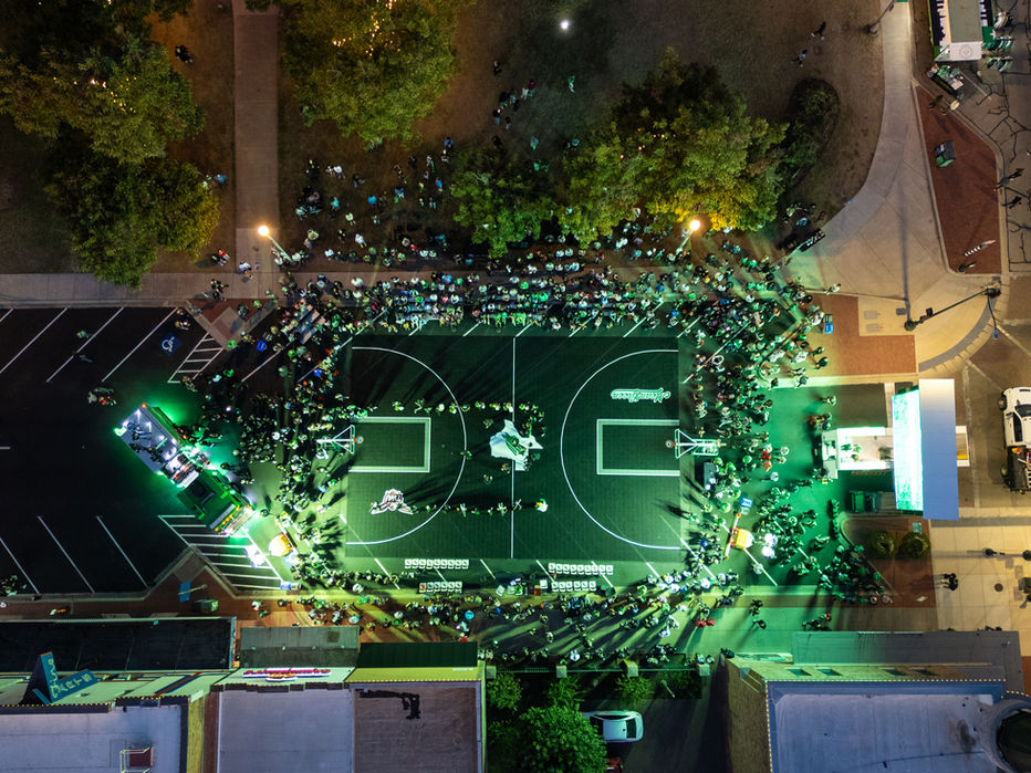A top down drone shot of the UNT and TWU basketball showcase, Nightmare on Elm St, on the Denton Square