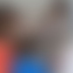 Students with their teacher, gathered around a chessboard for a Musical Chess class.