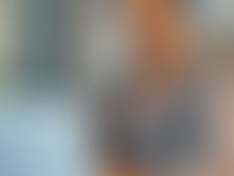 Small business owner confidently using laptop with IT support.